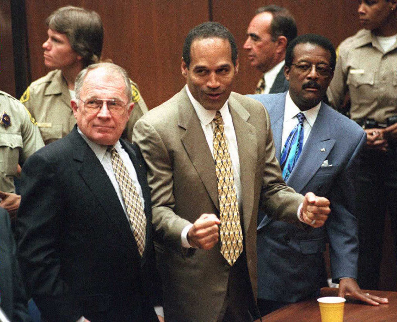 O.J. Simpson acquitted of 1994 murders of ex-wife and waiter after nine-month trial