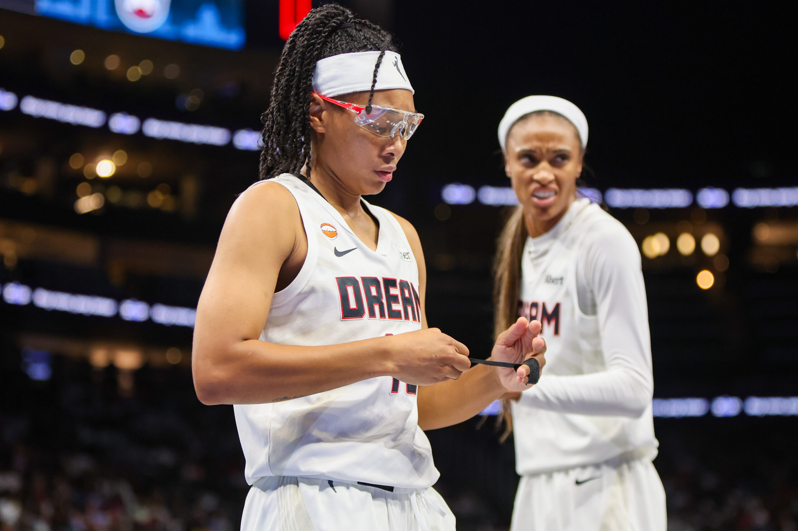 Dream star Allisha Gray exits playoff win with hand injury, status uncertain for Game 2